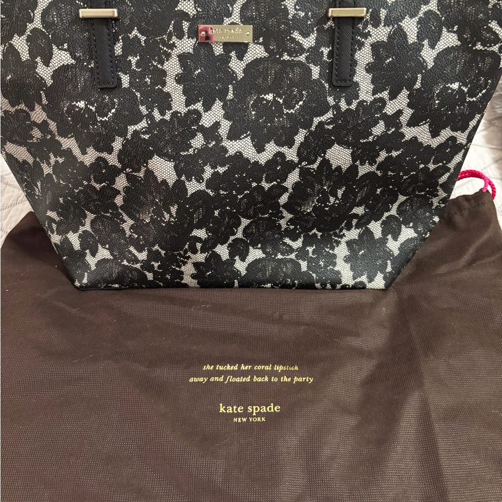 Kate Spade Black Lace Tote with Dust Bag.  Large inside zip & 2 open
pockets.